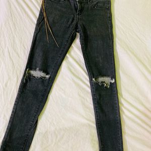 Faded Black Jeans With Knee Ripped