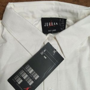 Jordan Men's Cream and Black Polo T-shirt