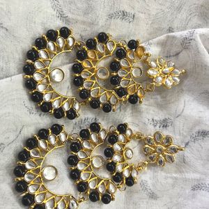 Two Black And Gold Earrings
