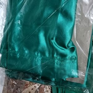 Sea Green Jimmy Choo Saree With Stitched Blouse