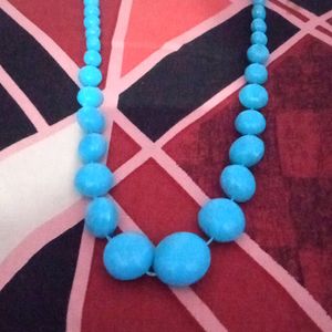 A Blue Coloed Baby Necklace