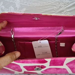 Pink & white Clutch with a silver sling