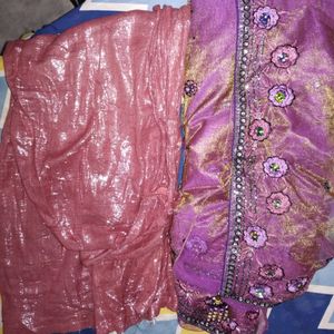 Net saree in purple colour havingg 2 shining shade