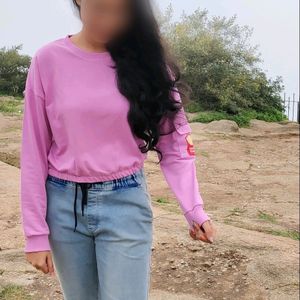 Top notch winter crop  sweatshirt purplish light pink color!  Sleeves ending with cuffs! Elasticated waist line