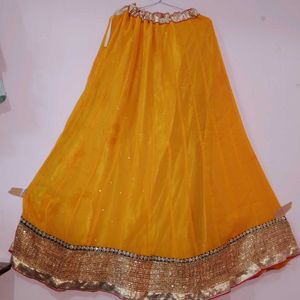 Rich Gold border Yellow lehenga with Pink dupatta