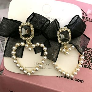 Korean Heart Shape Earrings With Bow Tie.