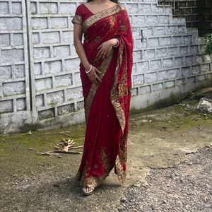 Red saree with golden zari work