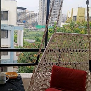 For Sale: Stylish Swing with Plush Red Cushion