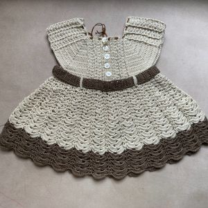 A Beautiful Crochet Dress For Baby Girl