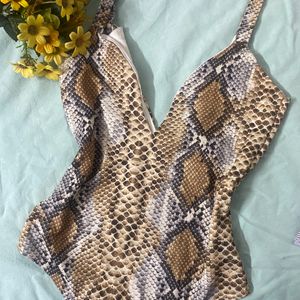 Leapord Print Bodysuit From PRETTYLITTLETHING