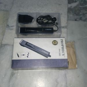 Shaving machine trimmer