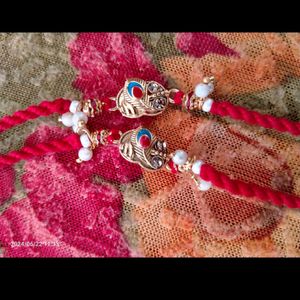 RAKHI With Red Beads, Pearls And Morpankh