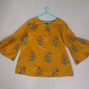 YELLOW SHORT KURTI WITH BELL SLEEVES