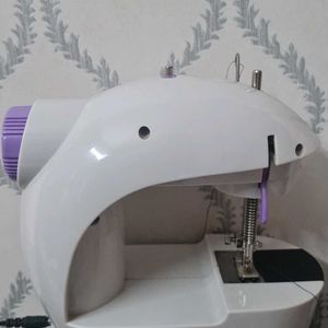 Mini Sewing Machine.