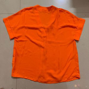 Orange boxy top