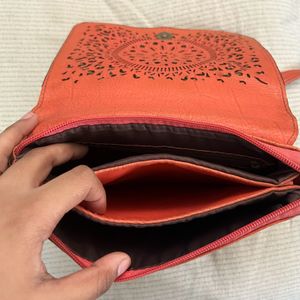 beautiful orange sling bag