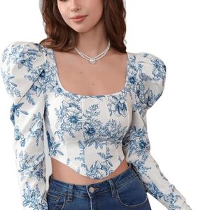 Floral Print: This long sleeve blouse features a v