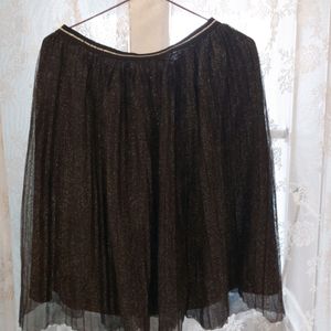 Shining black skirt with gilter effect