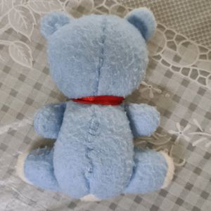 Sky Blue Teddy Bear with Red bow...a Stuffed Toy