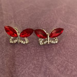 Fancy Jhumkas And Studs