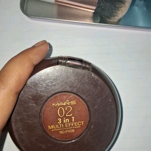 mars compact with makeup and blusher brush