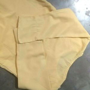 A Light Faded Yellow Pretty Top