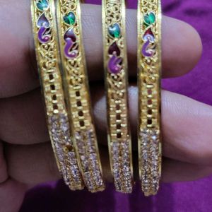 4 Bangles 1 Bracelet Never Used Before