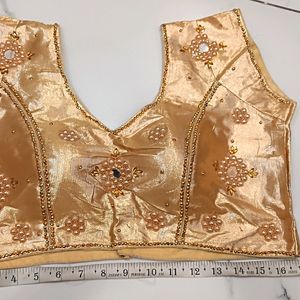 stone worked golden blouse