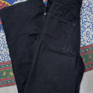 Black Flared Jeans With Cutout Detail