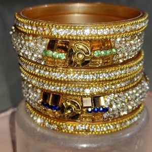 Multi-colored White Gold Stoned Bangles Set Of 8