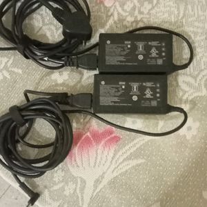 2 HP LAPTOP CHARGER 65 +65 WATT NEW AND ORIGINAL