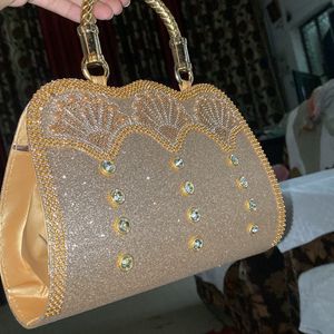 a clutch or uh can say purse for party