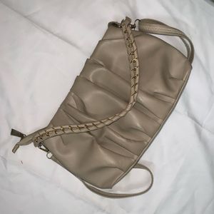 Beige Cremish Sling Bag.