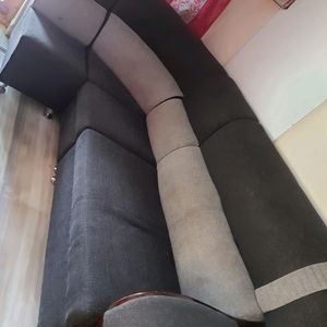 L-Shaped Sofa With 2 Cushions