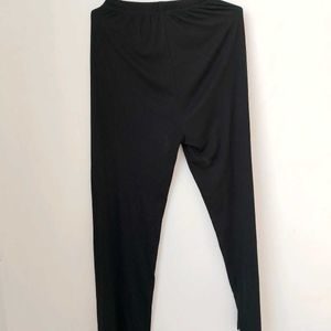 Black Ribbed Evergreen Trouser.