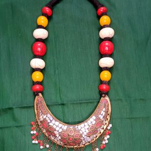 White, Yellow And Red Bohemian Necklace. 20 inches