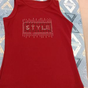 sleeveless top maroon colour with printed design