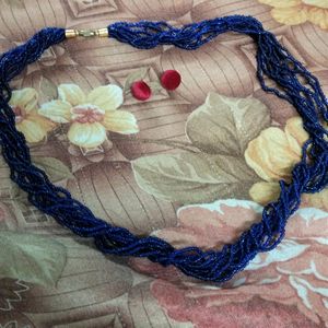 Blue Necklace And Red Velvet Earings.