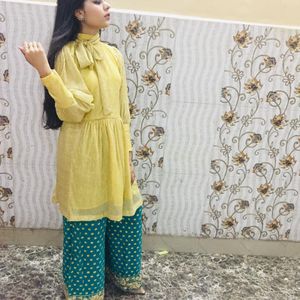 Heavy Worked Plazo And Styish Golden Kurta Set