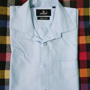 Light Blue And Half Sleeve Shirt.