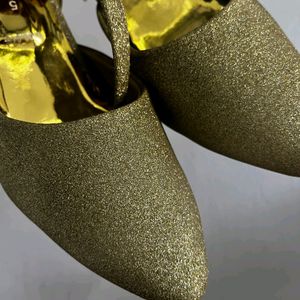 Golden glitter heel