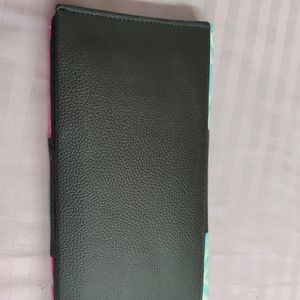 An Ikkat Ladies Wallet  With Multiple Pockets