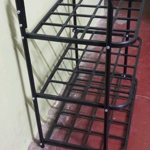 New/Unused Heavy Metal And Plastic Shoe Rack