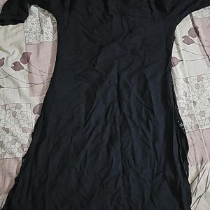 Its Black Top With Red And White Patterns