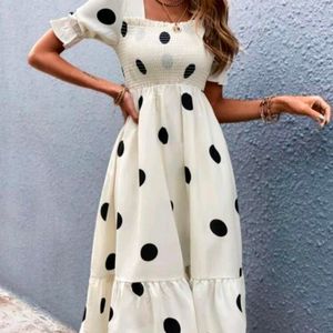 White Knee Length Dress With Black Polka Dots