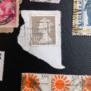 64 Used Postal Stamps