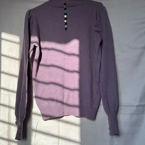 purple sweatshirt