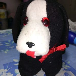 A Qute Black Dog Soft Toy