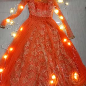 Orange color embroider gown for Women