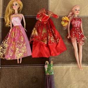 Two Dolls With Dresses